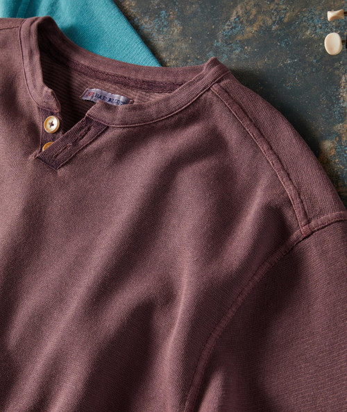 I Want More, Close-up of a brown casual shirt with a collar, buttons, and shoulder seam detail.