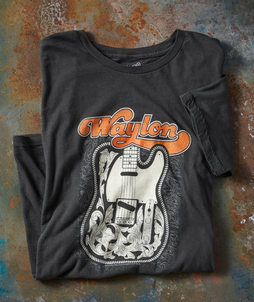 Six Strings Away T-shirt, black graphic tee featuring a vintage-style guitar illustration with ornate floral designs and the band name 'Waylon' in bold orange letters.