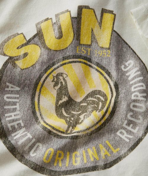 If You See My Rooster, product label featuring a rooster illustration and text on a fabric surface.