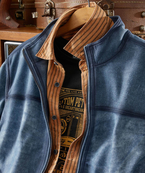 Blue Soul - Leather, blue leather jacket with orange striped button-up shirt underneath, hanging on a wooden hanger.