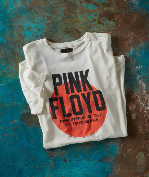 Echoes T-shirt, white graphic T-shirt with 'Pink Floyd' band logo and concert details printed on it, laid on a textured, multicolored surface.