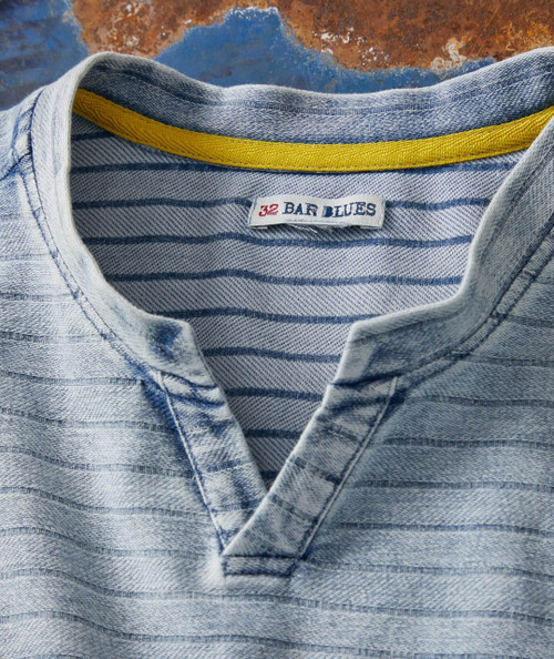 It Ain't Easy Bein' Easy T-shirt, close-up of the neckline showing a striped design with a yellow accent and the branded tag indicating size 32 and band name 'Bar Blues'.