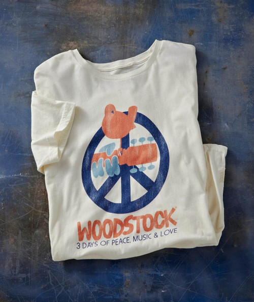 Soul Bird T-shirt, white t-shirt with a vintage Woodstock print featuring a bird sitting on a peace symbol, with the text "WOODSTOCK 3 DAYS OF PEACE, MUSIC & LOVE" underneath.