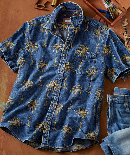 Palm Wine, traditional African-style denim shirt with palm tree embroidery.