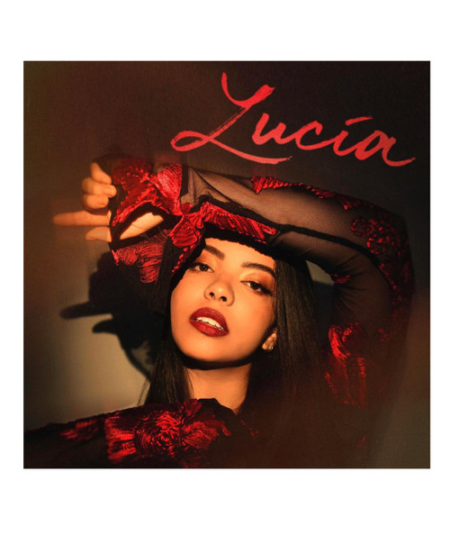 Lucía - Lucía product, close-up of a woman with dark hair wearing elegant black and red embroidered lace top, with hand on forehead and intense makeup, artistic fashion photograph.