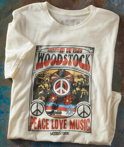 Blame It On My Youth T-shirt, vintage Woodstock summer of 1969 graphic with peace signs, flowers, a guitar, and hippie crowd.
