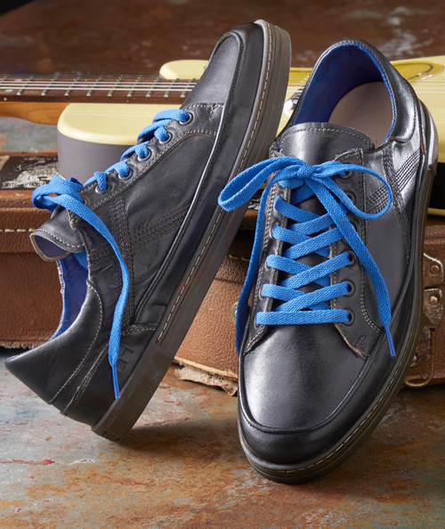 Pick Up The Tempo, stylish black leather sneakers with bright blue laces and cushioned soles.