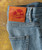32 Bar Blues No Better Than This - Light Indigo denim jeans, close-up of the waistband and leather patch with 32 Bar Blues logo.
