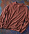 32 Bar Blues Bumpity Bump, brown textured long sleeve casual sweater on a colorful industrial background.
