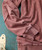 32 Bar Blues Here I Go Again album, close-up image of a pinkish-brown vintage sweatshirt with visible fabric details and stitching.