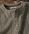 Past In The Present, Vintage textured button-up shirt with a ribbed collar and beige buttons.
