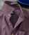 Twilight Time, close-up of a purple striped men's dress shirt with a button-down collar and beige buttons.