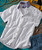 32 Flavors Men's Fashion Shirt, white short-sleeve button-up shirt with small blue geometric patterns and contrasting grey collar.