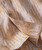Diamond Wave, close-up of a men's dress shirt with a detailed geometric pattern in peach and white, featuring a buttoned cuff.