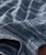 Borderline Blues, detailed image of blue and white patterned woven fabric fabric with geometric designs.