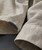 On The Dot, close-up image of the fabric showing a woven pattern with small multicolored dots on a beige background.