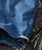 Point Made, close-up of distressed denim fabric with visible fading, stitching, and a rolled hem detail.