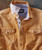 Early A.M. Attitude, men's tan denim shirt with two front chest pockets and contrasting white collar and placket.