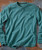 I Feel Better All Over, teal long sleeve shirt with textured fabric and front pocket.