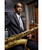 Javon Jackson - Jackson Plays Dylan, jazz saxophonist holding a golden saxophone in a recording studio.