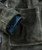 Havin' Myself A Time, close-up of a dark green suede jacket with a blue patterned cuff visible at the sleeve's opening.