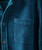 Boost It A Touch, close-up image of a blue and teal textured fabric pocket on a denim shirt with buttons.