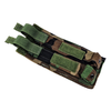 Specialty Defense Systems woodland camouflage double magazine pouch for HK MP5 with dual hook-and-loop retention straps and MOLLE-compatible design.