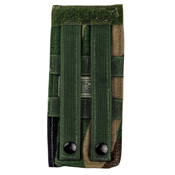 Rear view of Specialty Defense Systems woodland double MP5 magazine pouch showing MOLLE attachment straps with snap closures.