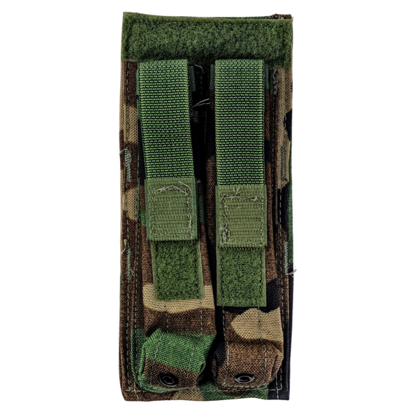 Front view of Specialty Defense Systems woodland camouflage double magazine pouch for HK MP5 with adjustable hook-and-loop retention flaps.