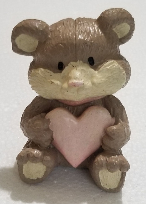 Mouse Figurine holding heart figurine Cute main picture of it.