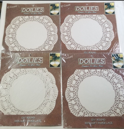 10 count of 4 packs 12 1/2 round paper lace Doilies showing the 4 packs