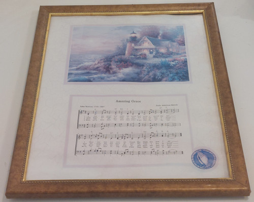 main photo showing the lithograph framed lying flat