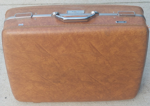main photo showing suitcase