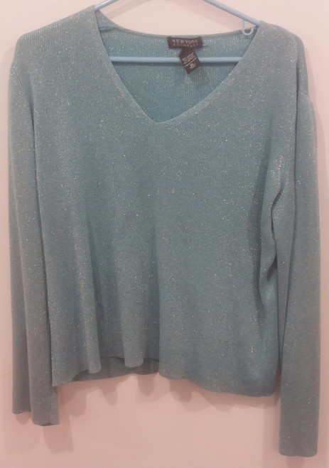 Main photo showing sweater.