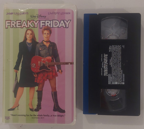 Front of clamshell case and VHS tape shown