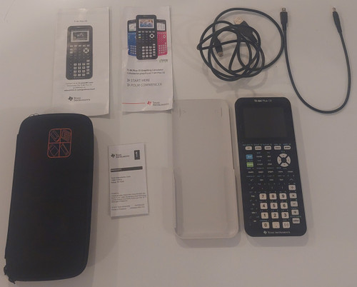 Showing Calculator, Calculator Cover, Warranty Card, Hard Shell Case 2 Charging Cords, Advertisement, and Instructions