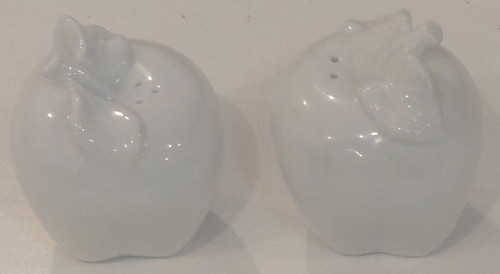 Showing pair of salt and pepper shakers Showing pair of salt and pepper shakers