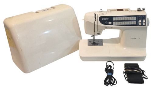 Main photo of Sewing machine shown with cover foot pedal and power supply