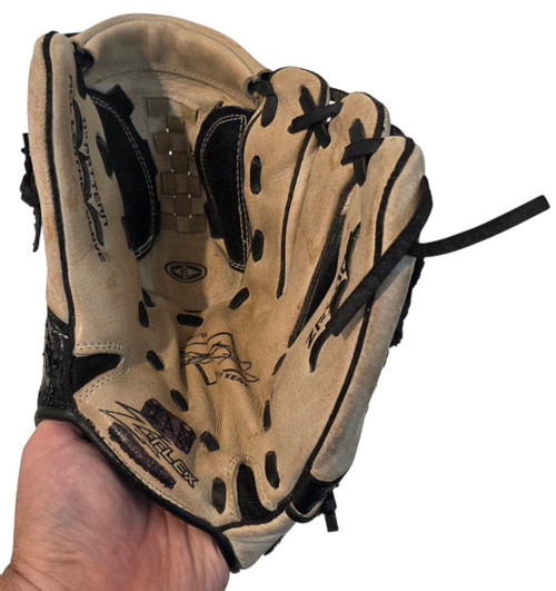Glove shown on a hand opened up