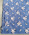 Milliken 6X9 Light Blue background flower floral carpet area rug close up of one of the corners
