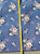 Milliken 6X9 Light Blue background flower floral carpet area rug close up showing the length of the rug