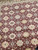 5X8 Atlas Carpet Weaving Area Rug Burgundy New Old Stock view of the center of the rug