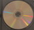 Playing side of disc shown.
