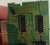 Close up photo of game circuit board shown.