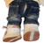 Back side jeans and shoes shown