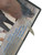 Front bottom shown on angle showing tear in plastic