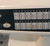 Front top left button shown