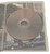 Playing side of one of the discs shown