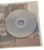 Playing side of one of the 4 discs shown