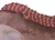 Close up showing wear spot on belt